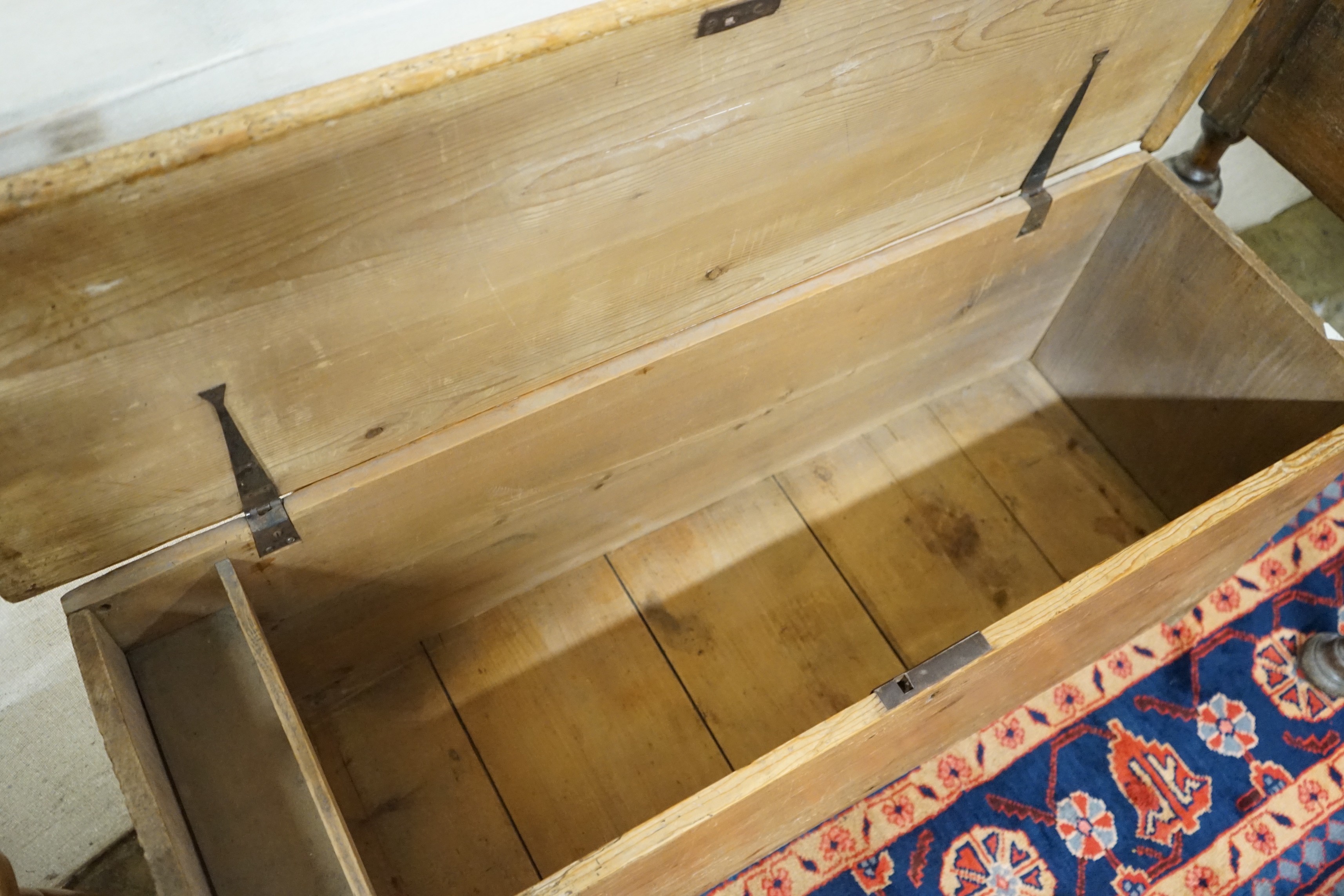 An early 19th century pine six plank coffer, length 115cm, depth 38cm, height 51cm *Please note the sale commences at 9am.